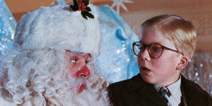 Peter Billingsley sits on Santa's lap in a scene from the film 'A Christmas Story', 1983. (Photo by Metro-Goldwyn-Mayer/Getty Images)